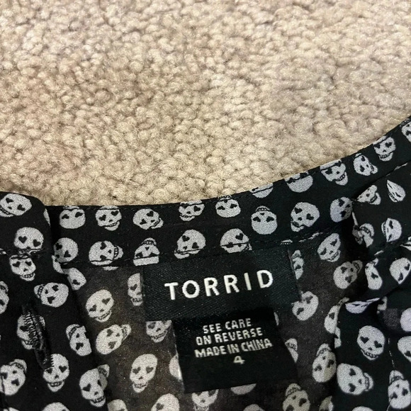 Torrid Georgette Ruffle Front Flutter Sleeve Blouse with Skulls - Picture 6 of 9